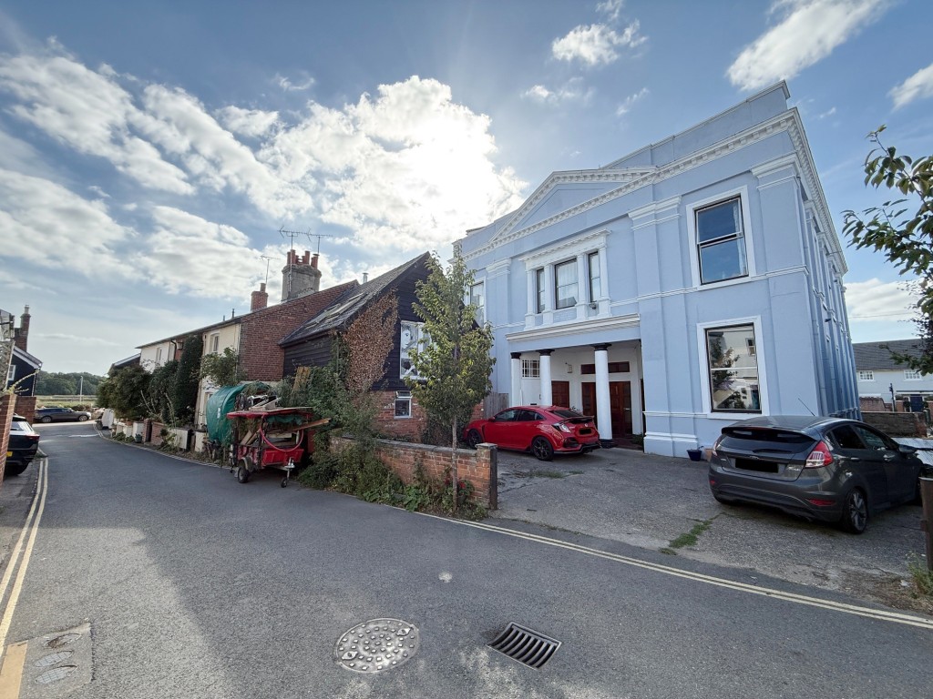 Lot: 5 - FORMER OFFICE AND BEDSITS WITH POTENTIAL CLOSE TO THE QUAYSIDE - View of the building the road leading to the Quayside